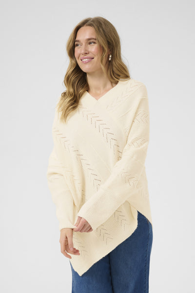 CRHoliday stickad poncho Eggnog Melange - 10610828 Thumbnail